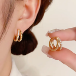 LuxeTwist Crystal Hoop Earrings – 18K Gold Plated | Eira Collections