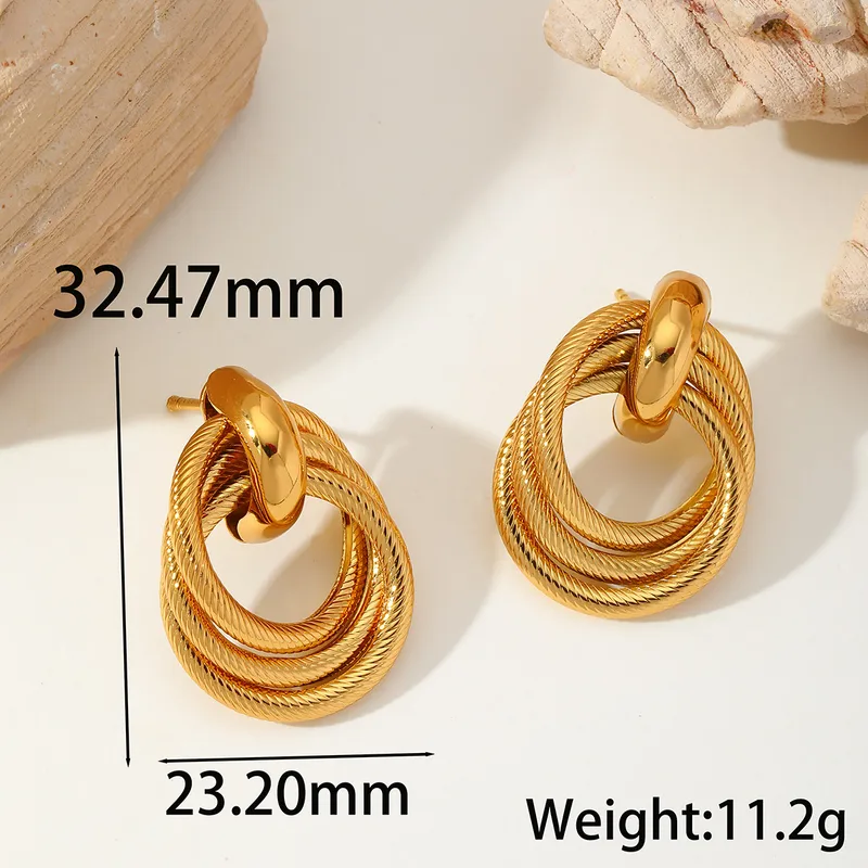 Golden Orbit Statement Earrings